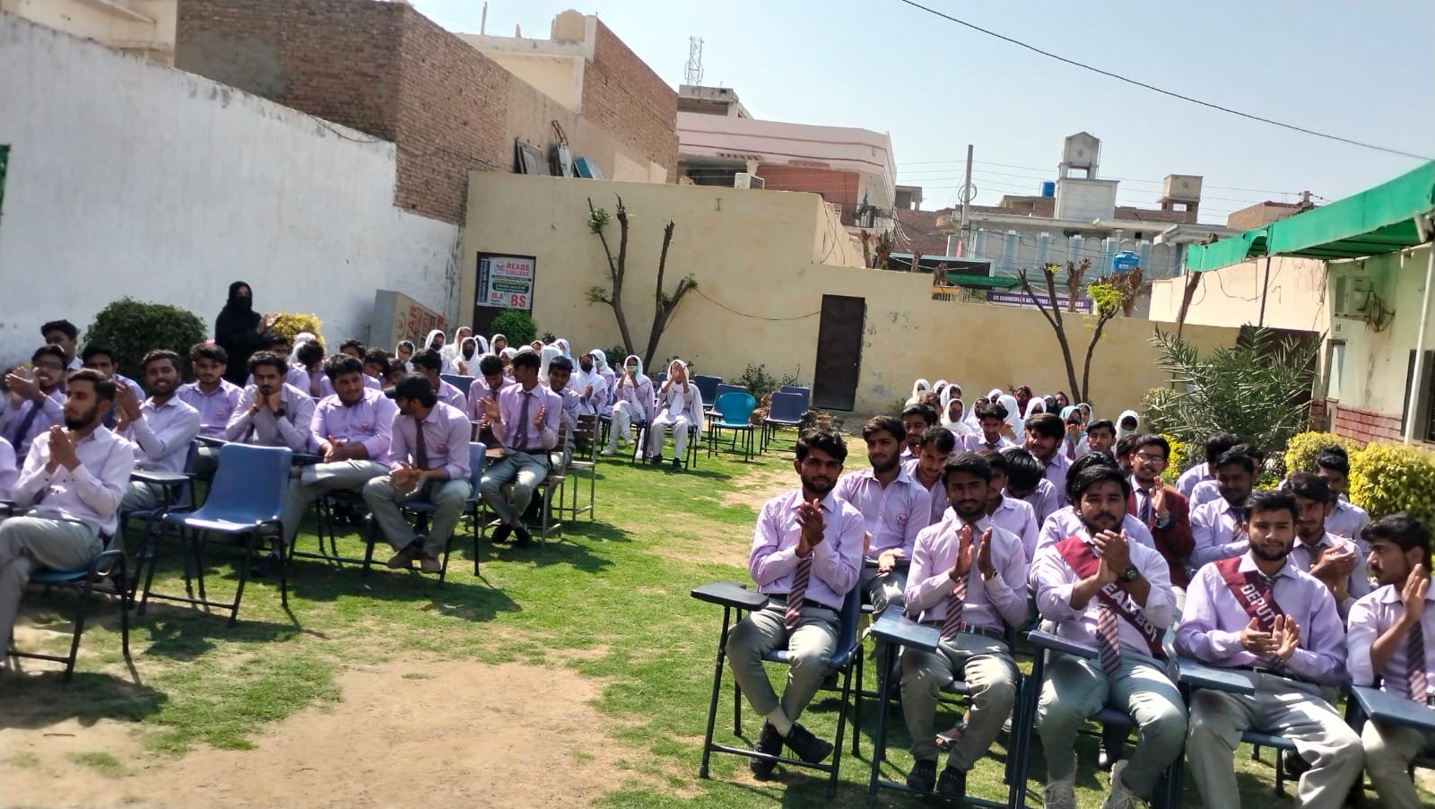 Students attending an outdoor event at READS College Bahawalpur